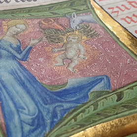 Maria, das Jesuskind sowie Ochs und Esel in einer Handschrift des 'Evangelienwerks' des Österreichischen Bibelübersetzers